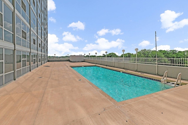 7234 W N Ave Unit 1203, Elmwood Park, IL 60707 - view of swimming pool with a patio