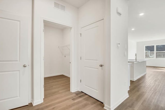 14653 S Greenbriar Dr, Plainfield, IL 60544 - hallway with light wood-style floors and recessed lighting