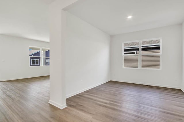 14653 S Greenbriar Dr, Plainfield, IL 60544 - spare room with wood finished floors and recessed lighting