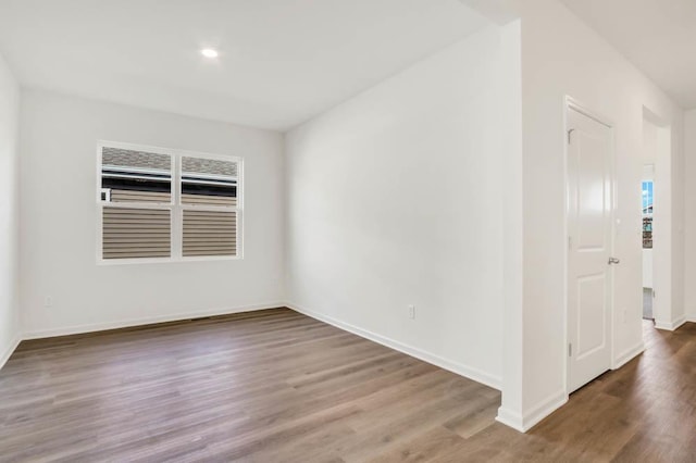14653 S Greenbriar Dr, Plainfield, IL 60544 - unfurnished room featuring healthy amount of natural light, wood finished floors, and recessed lighting