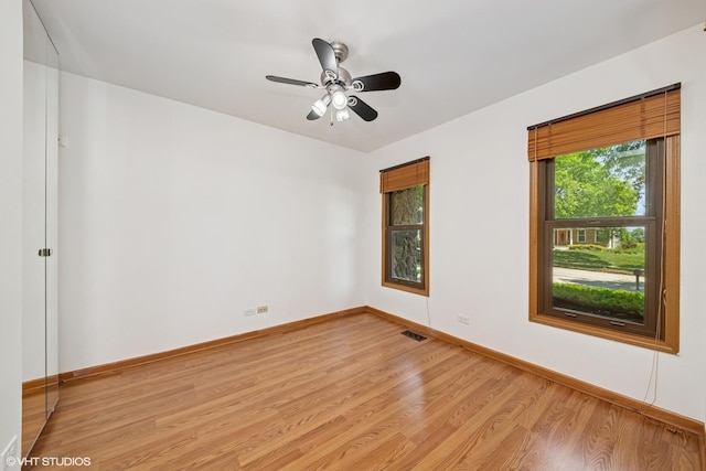 600 N Brookdale Dr, Schaumburg, IL 60194 - unfurnished room with light wood-style floors and a ceiling fan