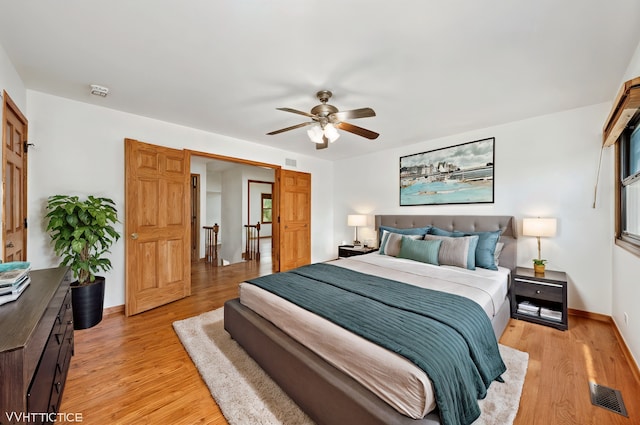 600 N Brookdale Dr, Schaumburg, IL 60194 - bedroom featuring light wood-type flooring and a ceiling fan