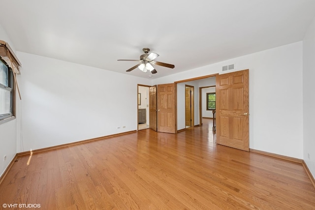 600 N Brookdale Dr, Schaumburg, IL 60194 - empty room with ceiling fan and light wood-style floors