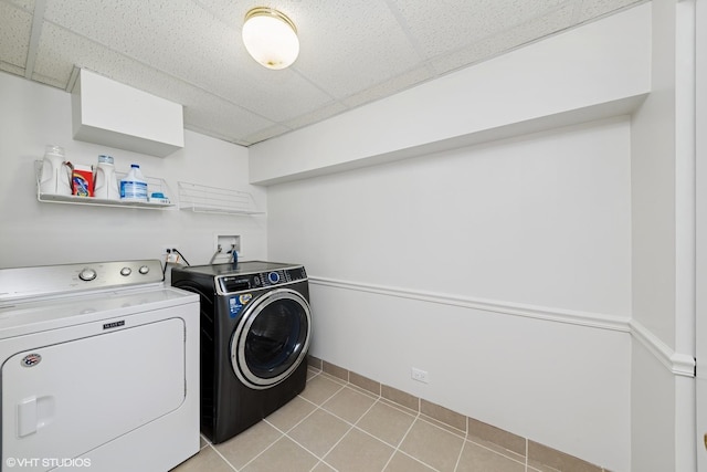 600 N Brookdale Dr, Schaumburg, IL 60194 - laundry room featuring washing machine and dryer and light tile patterned floors