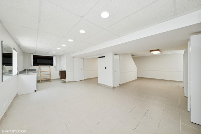 600 N Brookdale Dr, Schaumburg, IL 60194 - finished below grade area featuring recessed lighting, a drop ceiling, and light tile patterned floors