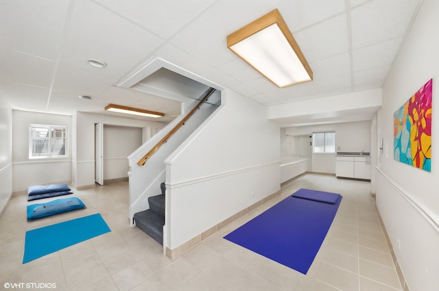 600 N Brookdale Dr, Schaumburg, IL 60194 - workout area featuring a drop ceiling and tile patterned flooring