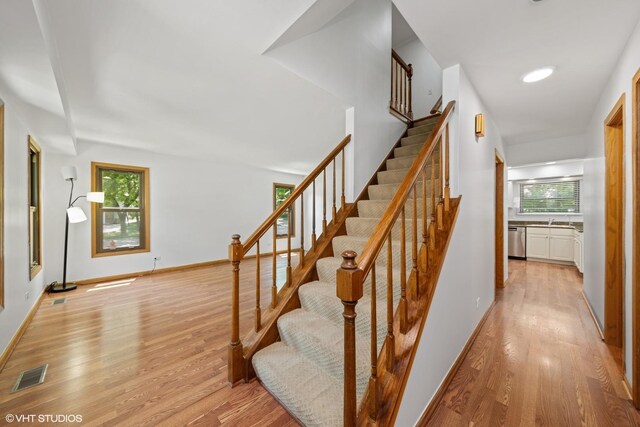 600 N Brookdale Dr, Schaumburg, IL 60194 - stairs with wood finished floors and baseboards