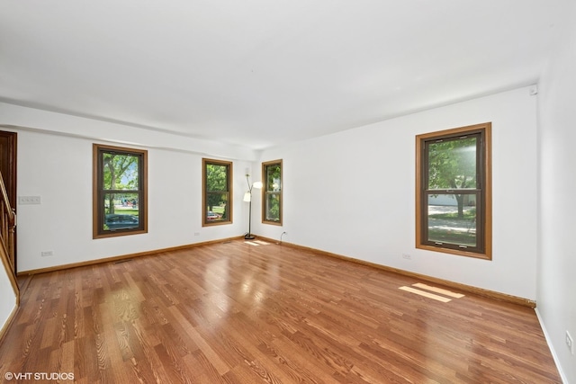 600 N Brookdale Dr, Schaumburg, IL 60194 - empty room featuring wood finished floors and baseboards