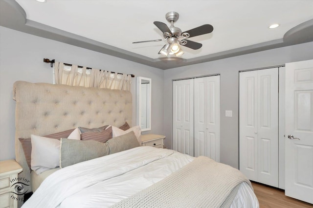 16838 S 91st Ave, Orland Hills, IL 60487 - bedroom featuring multiple closets, wood finished floors, recessed lighting, and a ceiling fan