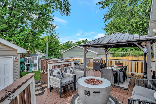 16838 S 91st Ave, Orland Hills, IL 60487 - wooden terrace with an outdoor living space with a fire pit, a gazebo, grilling area, outdoor dining space, and a shed