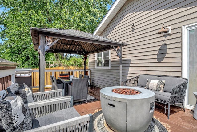 16838 S 91st Ave, Orland Hills, IL 60487 - wooden deck featuring a gazebo, an outdoor living space with a fire pit, and outdoor dining space
