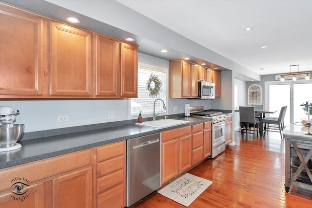 16838 S 91st Ave, Orland Hills, IL 60487 - kitchen with appliances with stainless steel finishes, dark countertops, wood finished floors, and recessed lighting
