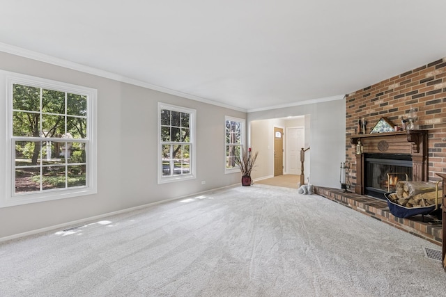 5618 Marietta Dr, Crystal Lake, IL 60014 - unfurnished living room with carpet, crown molding, healthy amount of natural light, and a brick fireplace
