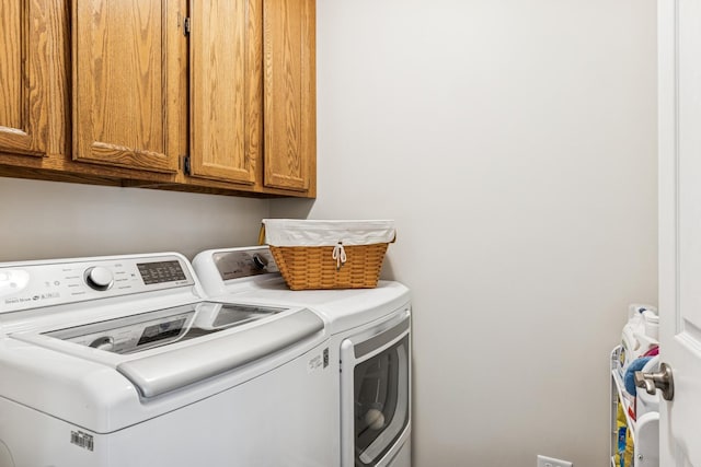 5618 Marietta Dr, Crystal Lake, IL 60014 - laundry room featuring washing machine and clothes dryer and cabinet space