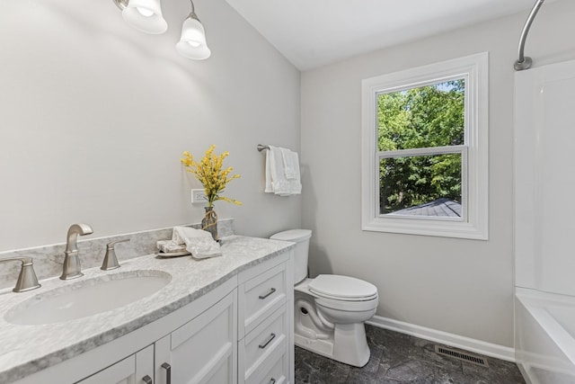 5618 Marietta Dr, Crystal Lake, IL 60014 - full bathroom with vanity, stone finish floors, and tub / shower combination