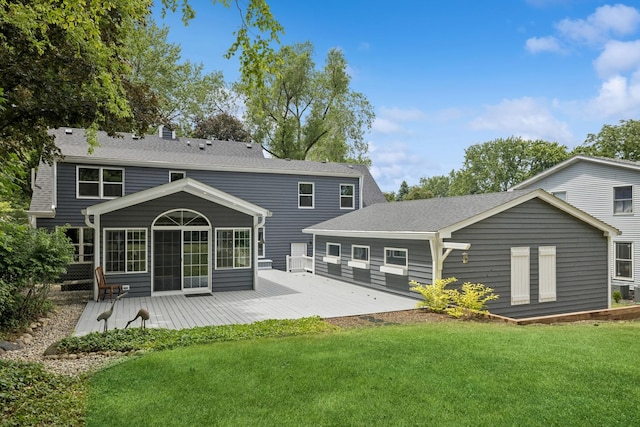 5618 Marietta Dr, Crystal Lake, IL 60014 - rear view of house with a wooden deck, a yard, and roof with shingles