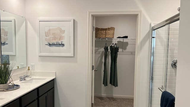 4201 High Point Ct, Joliet, IL 60436 - full bathroom featuring double vanity, a spacious closet, and a tile shower
