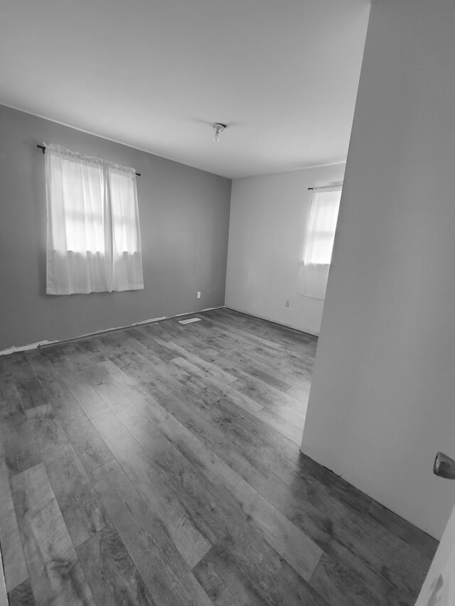 2305 Marmion Ave, Joliet, IL 60436 - unfurnished room with dark wood finished floors