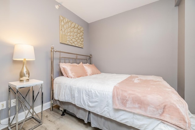 21 W Chestnut St Unit 907, Chicago, IL 60610 - bedroom featuring wood finished floors and lofted ceiling