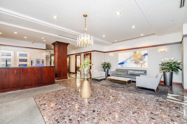 21 W Chestnut St Unit 907, Chicago, IL 60610 - welcome area with a chandelier, recessed lighting, and ornate columns