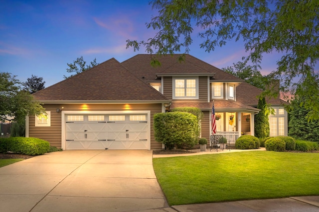5056 Switch Grass Ln, Naperville, IL 60564 - traditional-style house with a porch, an attached garage, a front lawn, concrete driveway, and a shingled roof