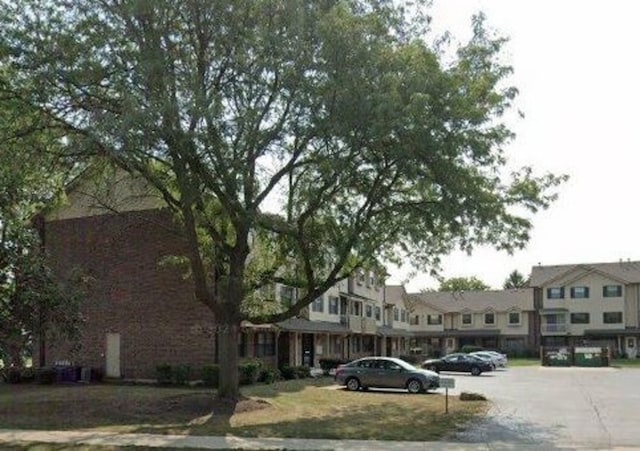 1486 W Jefferson Ave Unit C, Naperville, IL 60540 - view of front of house with uncovered parking