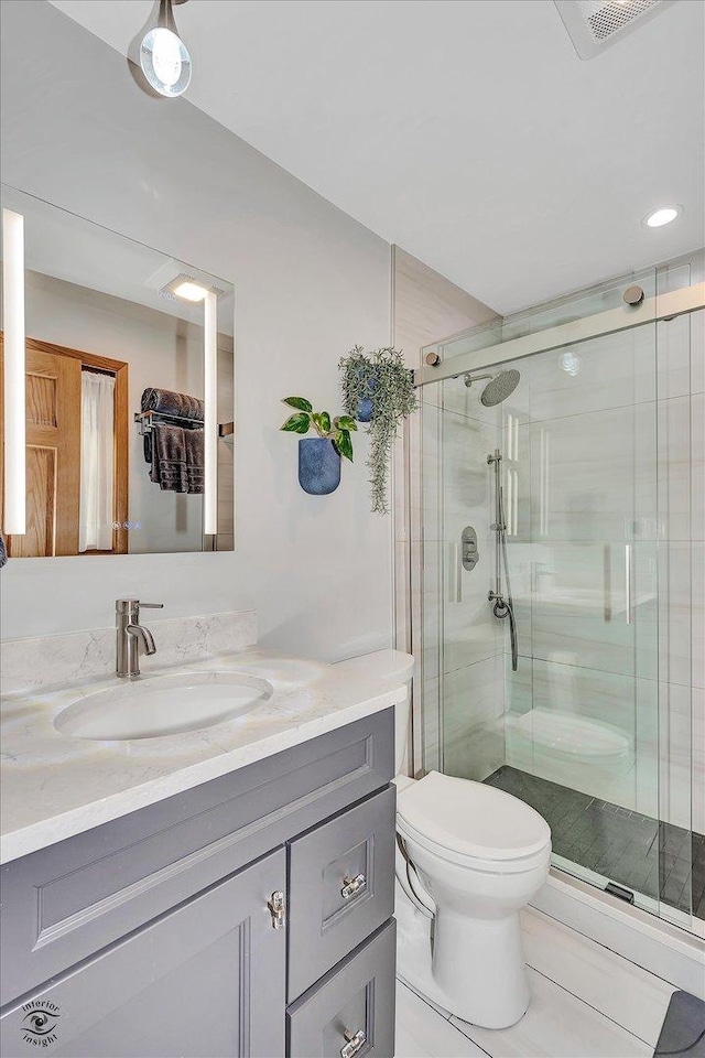 13348 S Stephen Dr, Palos Park, IL 60464 - full bath featuring vanity, a stall shower, tile patterned flooring, and recessed lighting