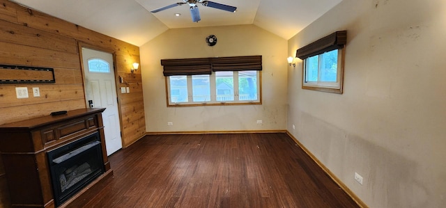504 W Avery St, Elmhurst, IL 60126 - unfurnished living room with a ceiling fan, dark wood finished floors, lofted ceiling, and wooden walls
