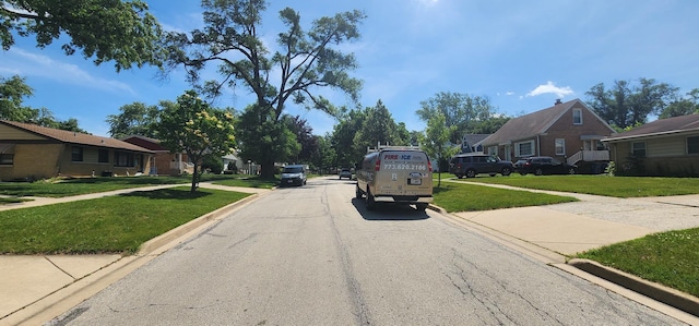 504 W Avery St, Elmhurst, IL 60126 - view of asphalt street featuring a residential view, curbs, and sidewalks