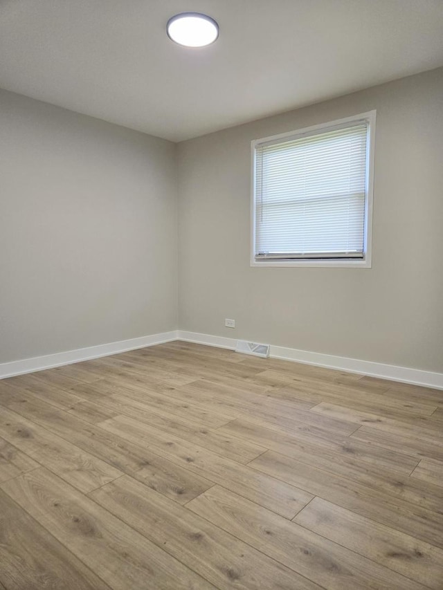 16536 Wolcott Ave, Markham, IL 60428 - unfurnished room featuring light wood-style floors and baseboards