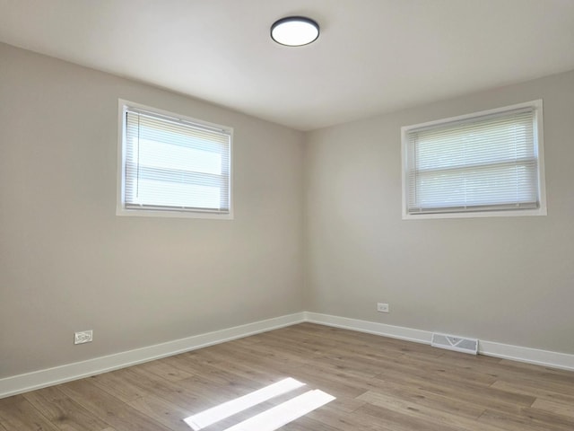 16536 Wolcott Ave, Markham, IL 60428 - empty room with light wood-type flooring
