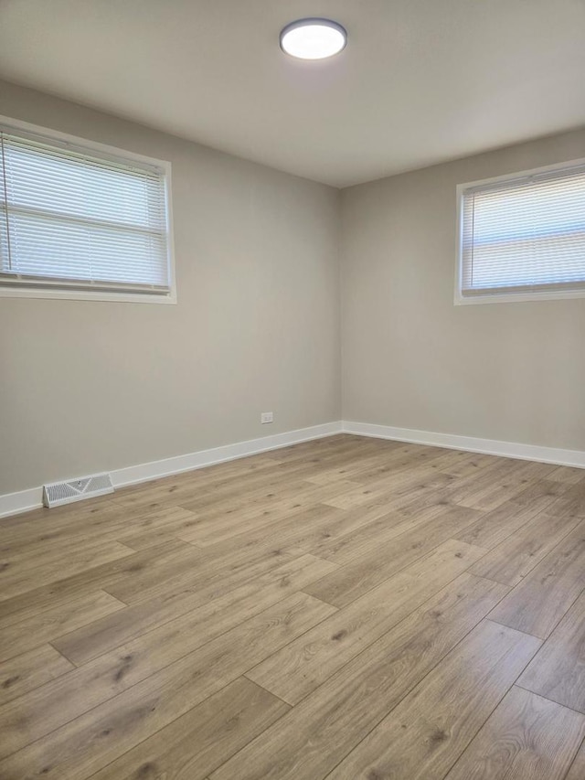 16536 Wolcott Ave, Markham, IL 60428 - empty room featuring light wood-style flooring and baseboards