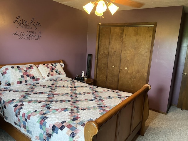 18367 US-150 Hwy, Bloomington, IL 61705 - bedroom with light carpet, a closet, and ceiling fan