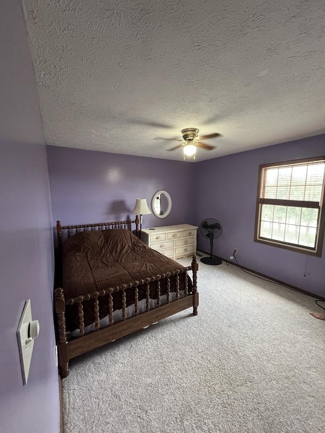 18367 US-150 Hwy, Bloomington, IL 61705 - bedroom with carpet flooring, a ceiling fan, and a textured ceiling
