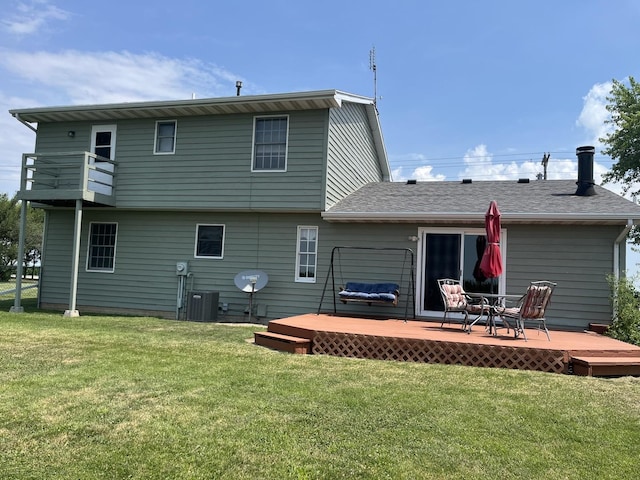 18367 US-150 Hwy, Bloomington, IL 61705 - back of property with a deck, a lawn, and a balcony