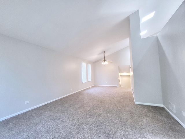 14326 Irving Ave, Dolton, IL 60419 - empty room featuring vaulted ceiling, carpet flooring, and a ceiling fan