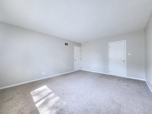 14326 Irving Ave, Dolton, IL 60419 - carpeted empty room with baseboards