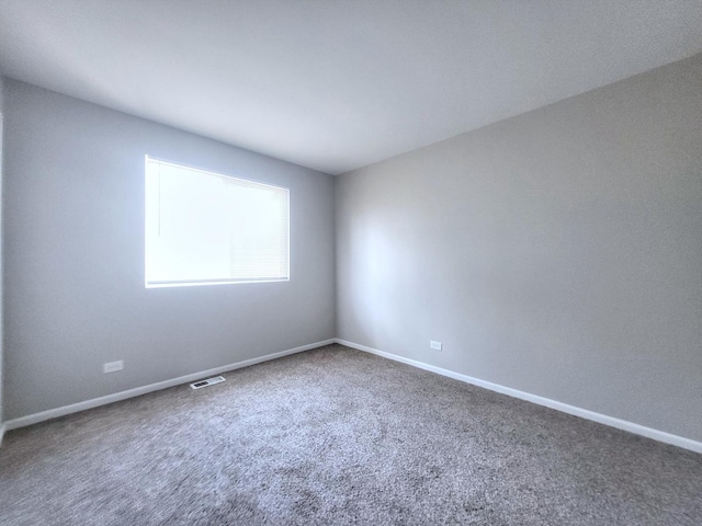 14326 Irving Ave, Dolton, IL 60419 - carpeted spare room featuring baseboards