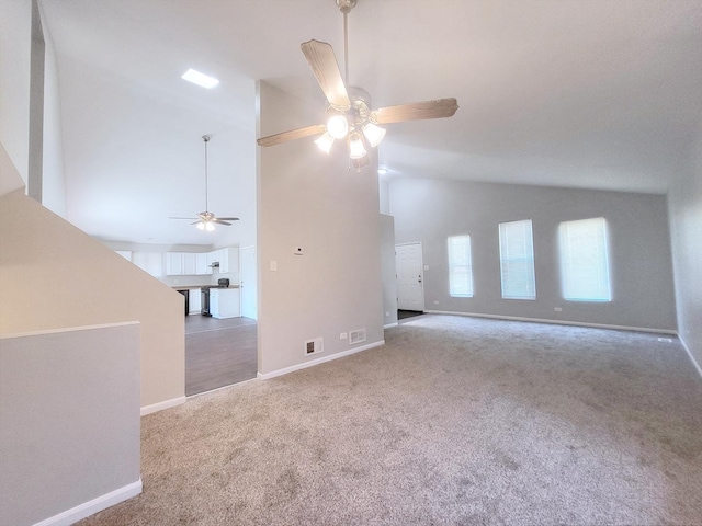 14326 Irving Ave, Dolton, IL 60419 - unfurnished living room featuring ceiling fan, carpet, and high vaulted ceiling