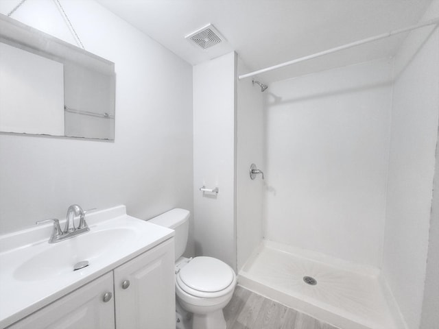 14326 Irving Ave, Dolton, IL 60419 - full bath with a stall shower, vanity, and wood finished floors