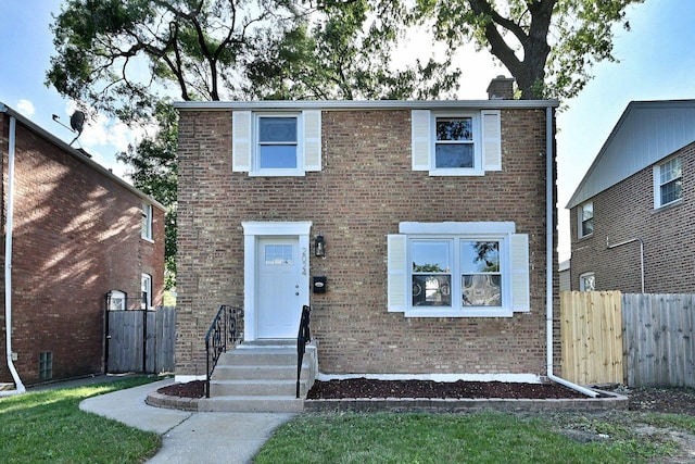 2024 S 24th Ave, Broadview, IL 60155 - view of front of home featuring brick siding and a chimney