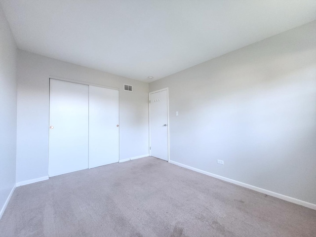 6037 Spring Ln, Matteson, IL 60443 - unfurnished bedroom featuring carpet and a closet