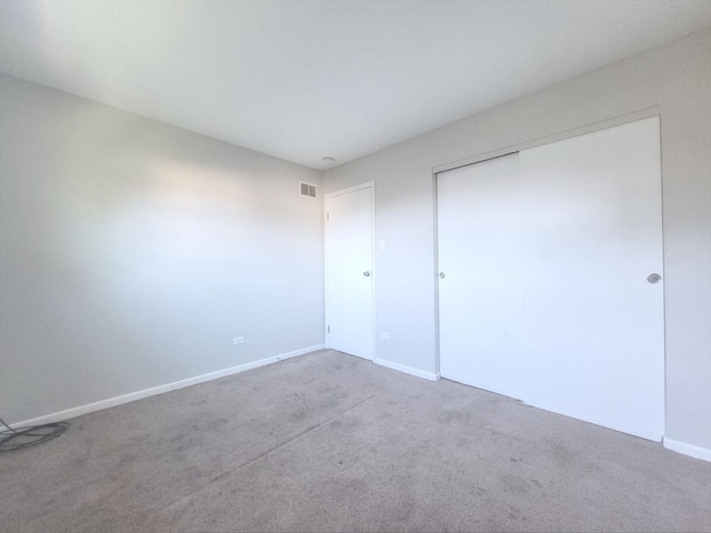 6037 Spring Ln, Matteson, IL 60443 - unfurnished bedroom featuring carpet floors and a closet