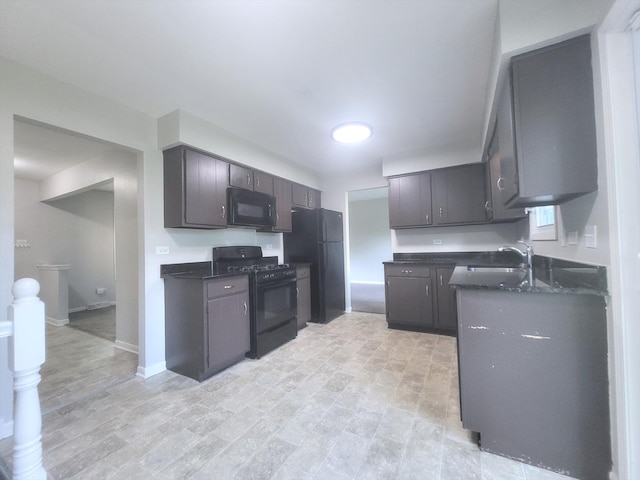 6037 Spring Ln, Matteson, IL 60443 - kitchen featuring black appliances and dark stone counters