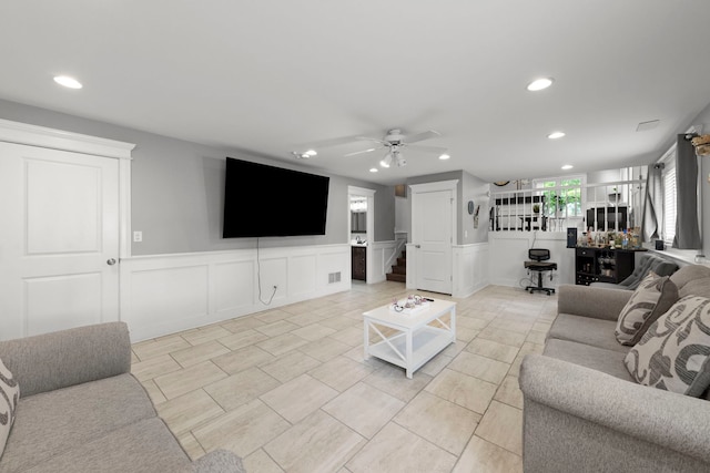 14301 S California Ave, Posen, IL 60469 - living room with recessed lighting, stairway, a decorative wall, a wainscoted wall, and ceiling fan