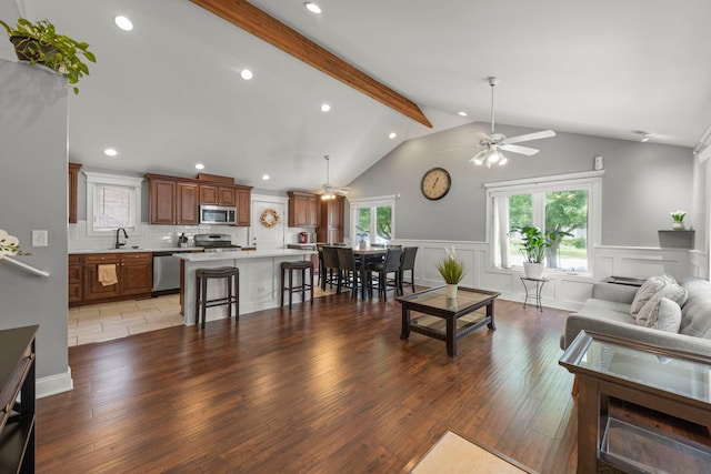 14301 S California Ave, Posen, IL 60469 - living room with ceiling fan, wainscoting, recessed lighting, light wood-style floors, and a decorative wall