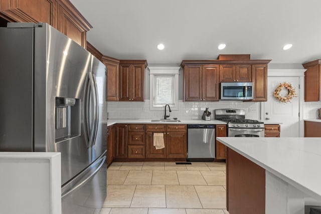 14301 S California Ave, Posen, IL 60469 - kitchen with appliances with stainless steel finishes, decorative backsplash, light countertops, recessed lighting, and light tile patterned floors