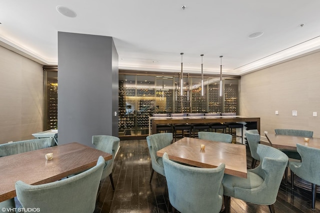 118 E Erie St Unit 19C, Chicago, IL 60611 - dining area featuring wood finished floors and a community bar