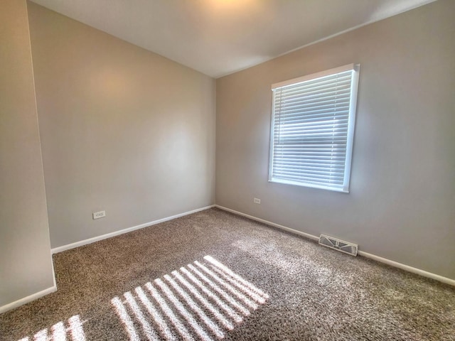 127 N Cedar Ln, Glenwood, IL 60425 - unfurnished room with carpet and baseboards