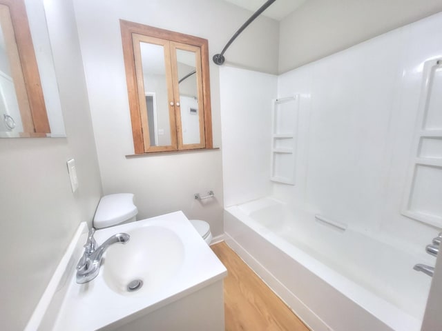 127 N Cedar Ln, Glenwood, IL 60425 - full bathroom featuring tub / shower combination, wood finished floors, and vanity